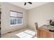 Bedroom with natural light from the window, and ceiling fan at 11680 Crow Hill Dr, Parker, CO 80134