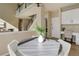 Dining area adjacent to staircase and front door, complete with built-in office space at 11680 Crow Hill Dr, Parker, CO 80134