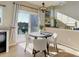 Cozy eat-in kitchen area adjacent to the living room featuring a sliding glass door at 11680 Crow Hill Dr, Parker, CO 80134