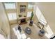 Spacious living room with high ceilings, fireplace, and abundant natural light at 11680 Crow Hill Dr, Parker, CO 80134