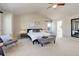 Spacious main bedroom features vaulted ceiling and seating area, creating a relaxing retreat at 11680 Crow Hill Dr, Parker, CO 80134