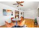 Open dining area featuring a modern table set and open access to the kitchen at 951 S Osage St, Denver, CO 80223