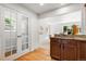 Well-lit kitchen area with granite countertops, wooden cabinets and an open design at 951 S Osage St, Denver, CO 80223
