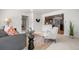 Comfortable living room with view to kitchen, showcasing a harmonious blend of style and functionality at 951 S Osage St, Denver, CO 80223
