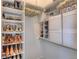 Walk-in closet featuring ample shelving and hanging space for shoes, clothes, and accessories at 3030 Wilson Ct # 5, Denver, CO 80205