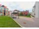 Attractive community green space with seating areas, landscaping, and modern buildings at 3030 Wilson Ct # 5, Denver, CO 80205
