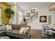 Cozy living room featuring comfortable seating and stairs leading to the upper level at 3030 Wilson Ct # 5, Denver, CO 80205