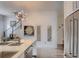 Bright, open-concept living area with a modern kitchen island and a staircase at 3030 Wilson Ct # 5, Denver, CO 80205