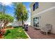 Backyard featuring a small lawn, privacy fence, and concrete patio at 5570 Perth Ct, Denver, CO 80249