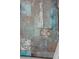 An abstract painting on the wall adds a touch of elegance to the space at 5471 W 97Th Pl # E, Broomfield, CO 80020
