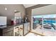 Convenient wet bar area provides access to the private roof deck at 5471 W 97Th Pl # E, Broomfield, CO 80020