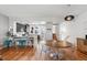 Open floor plan seamlessly connecting the modern kitchen and dining area, perfect for entertaining and everyday living at 5471 W 97Th Pl # E, Broomfield, CO 80020