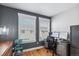 This office has two windows and a modern desk and is perfect for working from home at 5471 W 97Th Pl # E, Broomfield, CO 80020