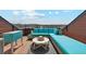 Inviting rooftop patio with comfortable seating, ideal for relaxation and outdoor entertainment at 5471 W 97Th Pl # E, Broomfield, CO 80020