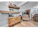 The finished basement has a wet bar, dining area, and comfortable living space at 55 S Flower St, Lakewood, CO 80226