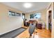 Bedroom with hardwood floors featuring closet and lots of natural light at 55 S Flower St, Lakewood, CO 80226