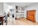 Bedroom with large closet and shelving space, desk, and vinyl flooring at 55 S Flower St, Lakewood, CO 80226