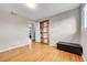 Bright bedroom features hardwood floors, a closet with unique doors and a window at 55 S Flower St, Lakewood, CO 80226