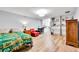 Spacious bedroom features a CSU themed bed and lots of closet space at 55 S Flower St, Lakewood, CO 80226