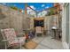 Outdoor patio area with colorful chairs and decor, perfect for relaxing at 55 S Flower St, Lakewood, CO 80226