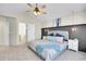 Inviting main bedroom featuring a comfortable bed, stylish nightstands, and ample natural light at 298 Hampstead Ave, Castle Rock, CO 80104