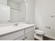 Clean and bright bathroom featuring a white vanity and tiled shower at 485 Interlocken Blvd # 101, Broomfield, CO 80021