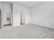 Open bedroom with soft carpet, multiple doors, and neutral decor at 485 Interlocken Blvd # 101, Broomfield, CO 80021