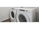 New white, front load washer and dryer at 485 Interlocken Blvd # 101, Broomfield, CO 80021