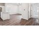 Bright living room with wood floors and an open layout at 485 Interlocken Blvd # 101, Broomfield, CO 80021