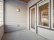 Back patio with concrete floor and view of tree at 485 Interlocken Blvd # 101, Broomfield, CO 80021