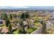 Aerial view showcasing the neighborhood and lush greenery surrounding the property at 5471 S Sherman St, Littleton, CO 80121