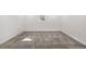 Unfurnished room featuring neutral carpeting and ample natural light at 5471 S Sherman St, Littleton, CO 80121