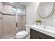 Modern bathroom with tiled shower, updated fixtures, and a sleek vanity at 5471 S Sherman St, Littleton, CO 80121