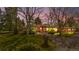 Charming brick ranch-style home with a well-manicured lawn and mature trees, offering great curb appeal at 5471 S Sherman St, Littleton, CO 80121