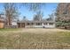 Exterior of house features a large backyard and white brick exterior at 3693 E Costilla Ave, Centennial, CO 80122