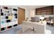 Bright home office with ample storage, desk and comfortable chair at 3693 E Costilla Ave, Centennial, CO 80122