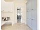 Hallway with custom cabinetry and designer touches at 6729 Bear Point Trl, Golden, CO 80403