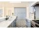 Gourmet kitchen featuring custom cabinets, modern appliances, and patterned tile floors at 6729 Bear Point Trl, Golden, CO 80403