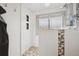 Clean and bright bathroom with tiled shower and modern fixtures at 8397 Chase Dr, Arvada, CO 80003