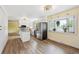 Bright, open kitchen features an island, stainless steel appliances and granite counters at 8397 Chase Dr, Arvada, CO 80003