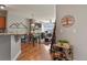 Inviting living room featuring hardwood floors and a cozy fireplace with a television above it at 9019 E Panorama Cir # D416, Englewood, CO 80112