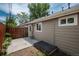 Backyard with concrete patio and wood fence at 3629 W Custer Pl, Denver, CO 80219