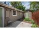 Backyard with shed, concrete patio, and wood fence at 3629 W Custer Pl, Denver, CO 80219