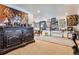 Basement featuring plush carpeting, recessed lighting, and walls adorned with decorative artwork at 1676 S Fairplay St, Aurora, CO 80012