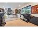 Open basement with plush carpeting, recessed lighting, and walls adorned with decorative artwork at 1676 S Fairplay St, Aurora, CO 80012