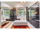 Walk-in closet featuring mirrored sliding doors and custom storage at 1676 S Fairplay St, Aurora, CO 80012