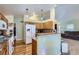 Kitchen with updated appliances and a breakfast bar at 433 N 15Th Ave, Brighton, CO 80601