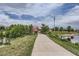 Community pathway leading to a playground area, with scenic views of the surrounding nature at 433 N 15Th Ave, Brighton, CO 80601