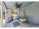 Covered patio with swing, ceiling fan, and a grill, perfect for relaxing at 433 N 15Th Ave, Brighton, CO 80601
