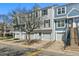 Attractive townhomes boast unique designs with private garages and well-maintained surroundings at 1699 S Trenton St # 147, Denver, CO 80231